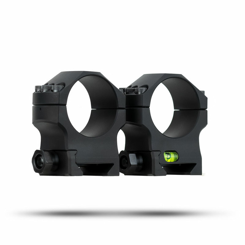 MDT Elite Scope Rings offer a solid, light weight mounting system for your optics. Made from precision-machined aluminum.

DETAILS
The MDT Elite Scope Rings offer a solid, lightweight mounting system for your optics. Made from precision-machined aluminum, they are available in 30mm, 34mm and 35mm diameters.

The two diameter options are available in four different heights (measured from top of rail to center of bore).

SPECIFICATIONS
Designed for ultimate precision and strength
25mm (0.984”) of lateral contact with scope tube
30mm (1.181”) of lateral contact with mounting rail
The main body is machined on an automated seven-axis, high-end CNC machine tool
Extra wide profile provides extremely stable mounting
The bottom rail interface is machined at the same time as the scope clamp interface, guaranteeing all rings are square and parallel
CMM checked to 1.5 millionths of an inch precision
Machined from Billet 7075-T651 Aluminum – 1/3 the weight of steel with similar strength
Extra thick clamp system will never bend, fatigue, or become loose with use
Built-in bubble level on medium, high, and extra-high rings (No bubble level on low rings)
Stepped base-to-cap interface allows the fasteners on one side to be tightened before making final scope alignment adjustments
Six oversized #8-32 Grade 8 fasteners used for clamping the scope
Sleek curves blend well into most scopes
MDT Precision Scope Rings are designed and manufactured to STANAG 4694 specification, also known as “NATO spec”. This means the scope ring sits tight to the top of the scope base rail, with pressure being applied to the underside of the angled rail surfaces to maintain a solid interface (as shown below). This design also allows mounting on out-of-spec rails: